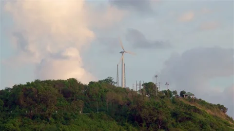A lonely wind power generator standing on a mountain Video stock 152750802