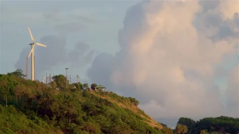 A lonely wind power generator standing on a mountain Video stock 152751198