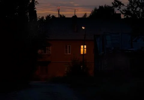 Lonely window in the night Stock Photos