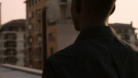 Lonely young black man walking in the Stock Video Pond5