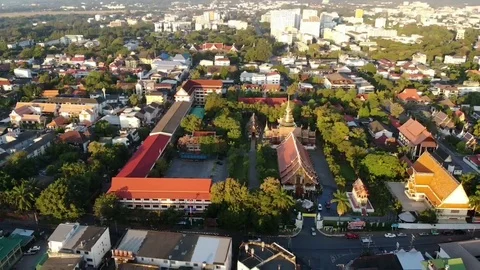 Long aerial backsweep from wat phra singh over half of old city Stock Footage 111417853