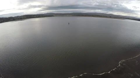 Long Aerial Drone Shot Over Peaceful River Vídeos de archivo 54057053