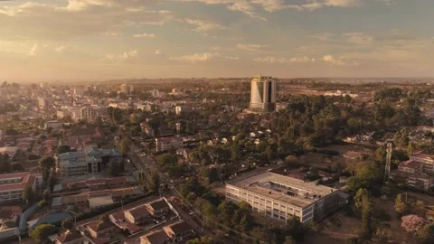 Long aerial pull over Eldoret city at golden hour Видео 130635029