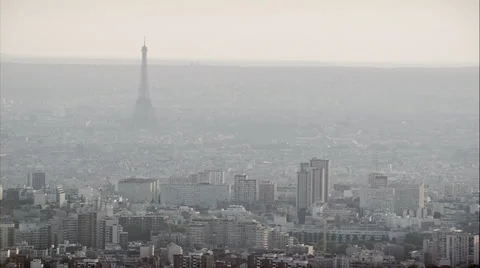 Long aerial shot of Paris with Eiffel Tower in the haze Stock Footage 33907612