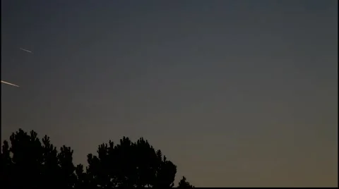 Long and short jet trail parallel racers 10x timelapse Stock-Footage 47622589