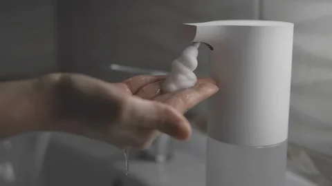 Long and thorough hand washing as protection method from infections and viruses Stock Footage 128062178