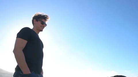 Long angled shot of man smiling towards the camera Stock Footage 59337431