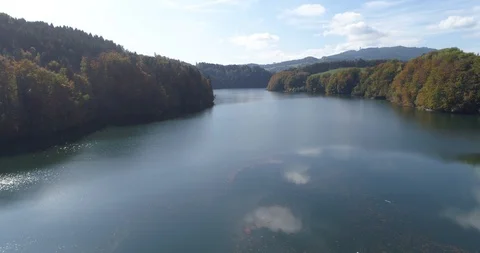 Long back flight over Rossens barrage and Gruyère lake - Aerial 4K Stock Footage 118908063
