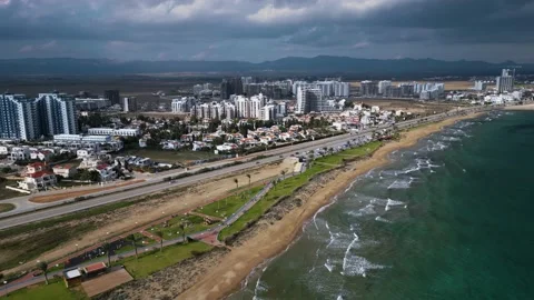 Long Beach Cyprus. Drone video. Blue ocean. Thunderclouds. Sunlights Stock Footage 231617295