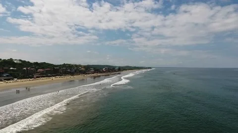 Long beach with ocean view in a cloudy day Stock Footage 145152952