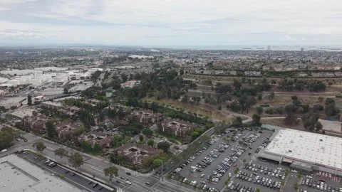 Long Beach suburban area with Costco warehouse, large parking lot, residential Stock-Footage 335942853