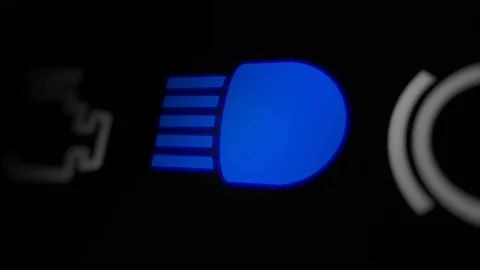 Long Beam (Vehicle's Headlights) Turned On, Warning Light on Car Dashboard Stock Footage 124448531