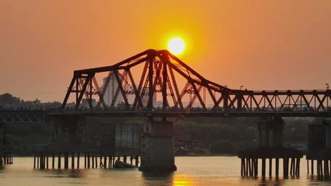 Long Bien Bridge at Sunset Over the Red River in Hanoi, Vietnam Stock Footage 344741861