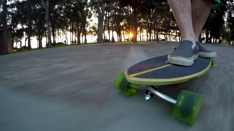 Long board skating on road sunset Stock Footage 82426425