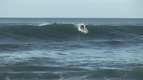 Long Board surfer ripping the wave in Hawaii Stock Footage 323244