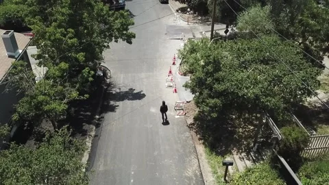 Long boarding down road Stock Footage 132016173