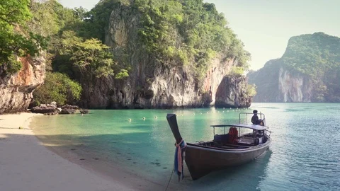 Long boat and small Koh Lao Lading island, Thailand Stock Footage 106475391