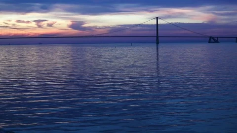 Long bridge against sunset view from huge ship bow Stock Footage 113093834