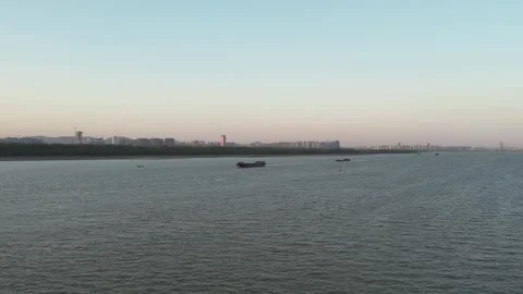 Long Bridge Crossing Lake At Sunset in Nanjing, China Stock Footage 344037185