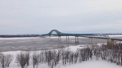 Long bridge perspective disappearing into winter horizon Stock Footage 329395401