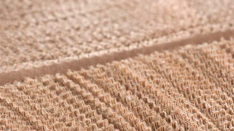 A long brown strip of thin sheets of kraft paper with a line pattern. texture Stock Photos