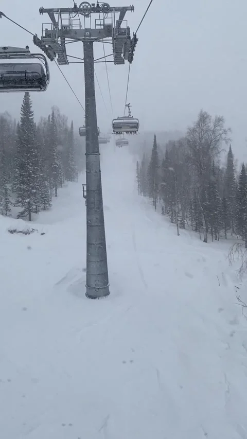 Long cable car line and ski lift working on top of the mountain. Concept of Stock-Footage 167973204