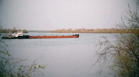 Long cargo barge on a river Stock Footage 66805649
