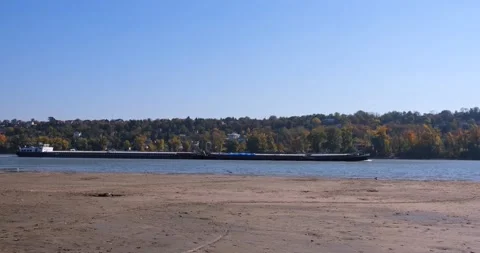 Long Cargo Ship Floating Slowly In The Water Video stock 163831287