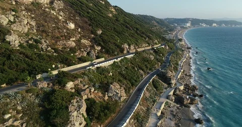 Long coastline, strong waves. Blue boundless sea and highway. Stock Footage 123112232