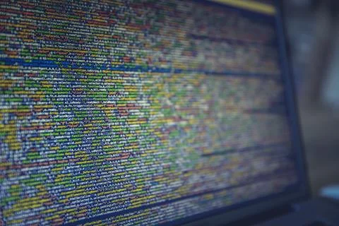 Long Colorful Lines of Code on A Computer Screen Stock Photos