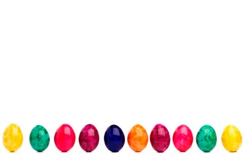 Long colorful row of easter eggs Stock Photos