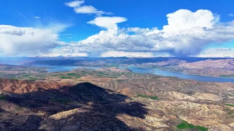Long Continuous Aerial Flight Forward Over a Vast Mountain Landscape Stock Footage 341973697