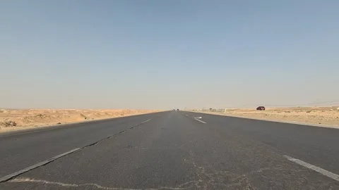 Long continuous drive Cairo Fayoum Desert Road peaceful desert road views Stock Footage 329851665