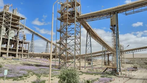 Long Conveyor Belt Transporting Raw Material from Quarry to Cement Plant 4K Stock Footage 331679987