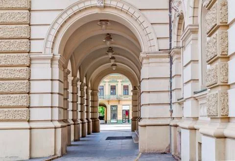 A long corridor between many columns Stock Photos