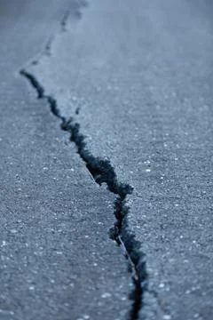 Long Crack in the Road Stock Photos