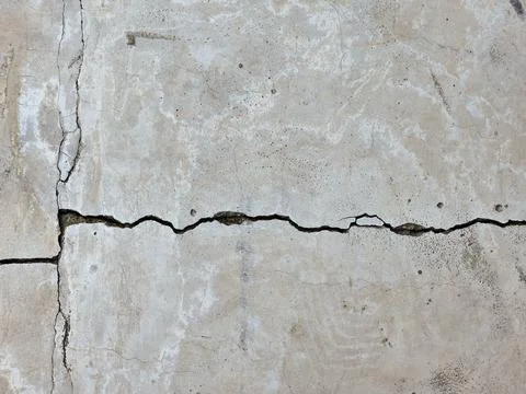 Long cracks in the cement surface Stock Photos