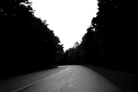 Long curving road. Spooky. SD. 스톡 동영상 825011