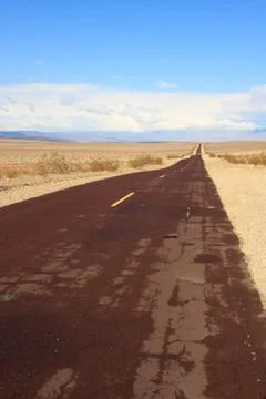 Long desert road Stock Photos