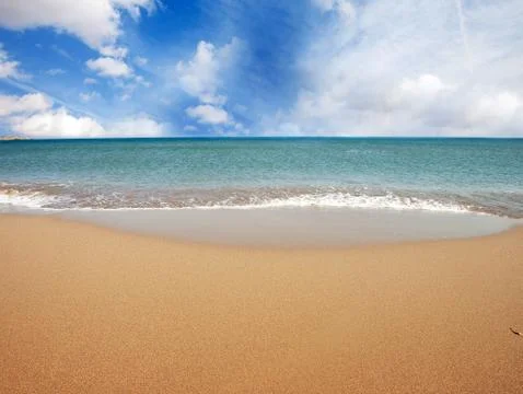 Long deserted beach Stock Photos