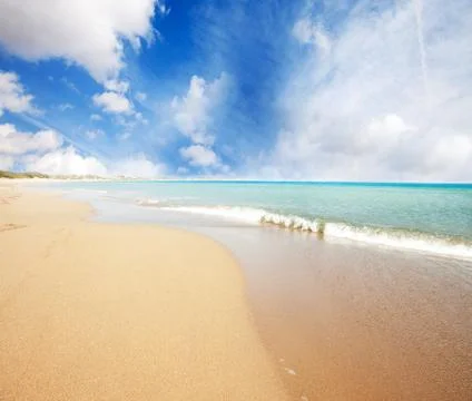 Long deserted beach Stock Photos