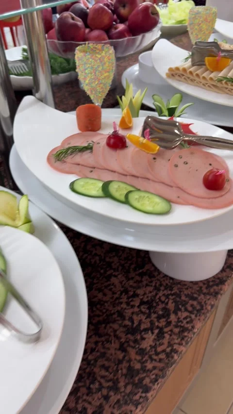 A long display of cold appetizers, including olives and cheeses, neatly arran Video stock 282799732