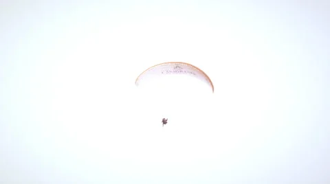 Long distance static shot of two people tandem paragliding in Switzerland Stock-Footage 52230572