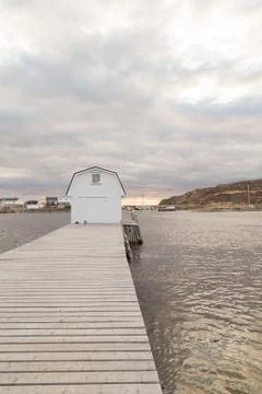Long Dock with Boathouse at End Stock Photos