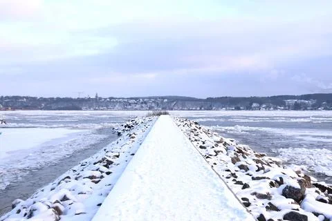 A long dock with snow Stock Photos