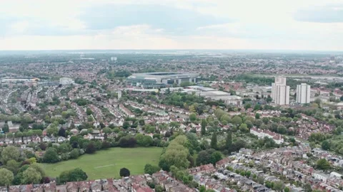 Long dolly forward drone shot towards twickenham stadium Stock Footage 156013419