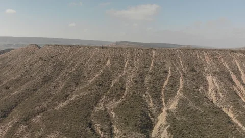 Long Drone Flight HIll to Immense Landscape Bardenas Reales Vídeos de archivo 103317980
