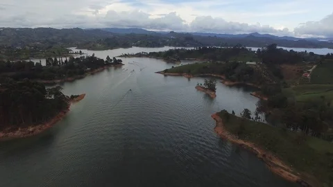 Long Drone flight over Guatape reservoir, Colombia. Stock Footage 122081153