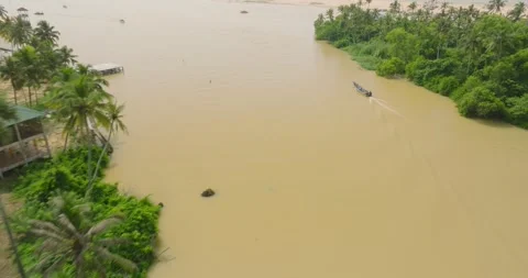 Long Drone Sequence Following Boat in Kerala Backwaters Stock Footage 328712368