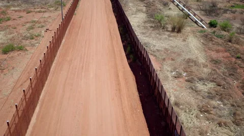 Long drone shot of US border fence Stock-Footage 63442366